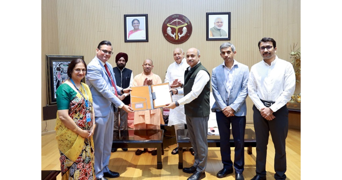 Yogi Adityanath handing over land allotment letter to BEL chairman for Chitrakoot defense node